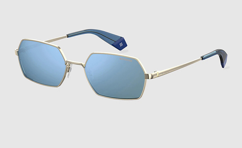 Gafas de Polaroid hexagonales doradas y lentes polarizadas azules. Gafas de Polaroid hexagonales doradas y lentes polarizadas azules.